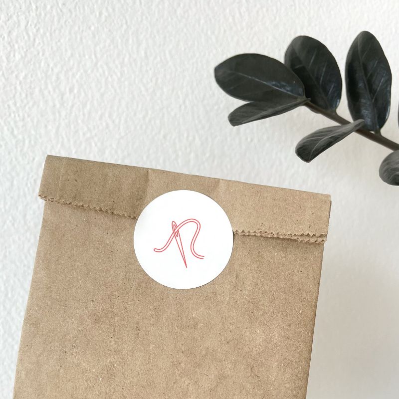 Sealed package with Practical Embroidery sticker